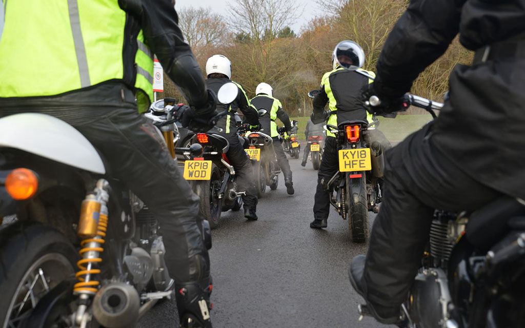 Motorcyclists riding together on the road