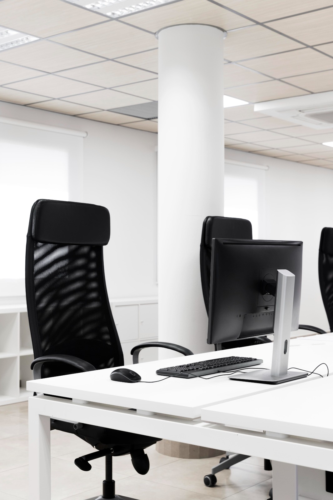 Modern office furniture in a well-lit workspace