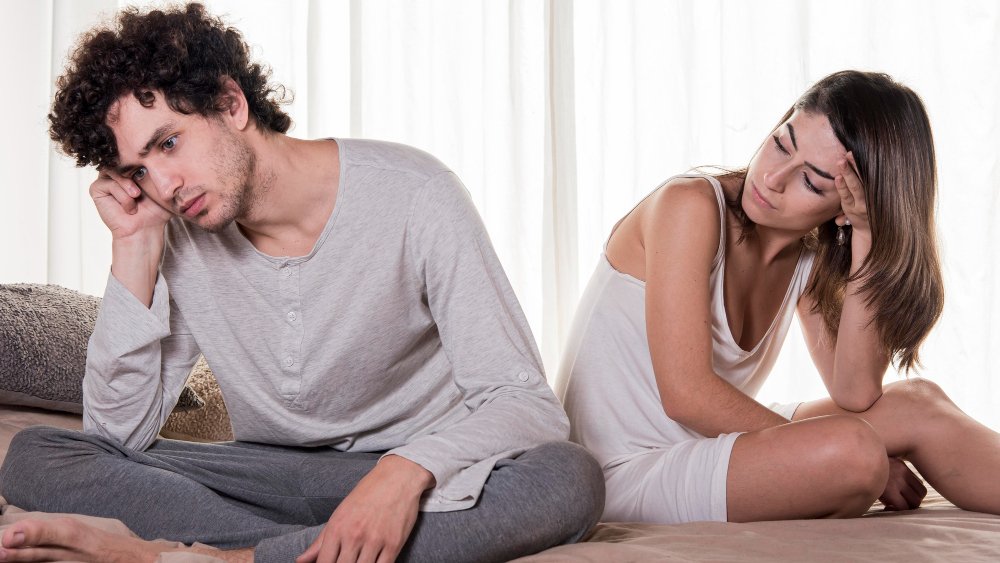 Malegra will help to combat ed. Because a frustrated and depressed man sitting on the edge of the bed after conflict with his wife because of his erectile dysfunction problem.